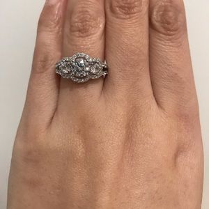 New silver round three stone engagement ring